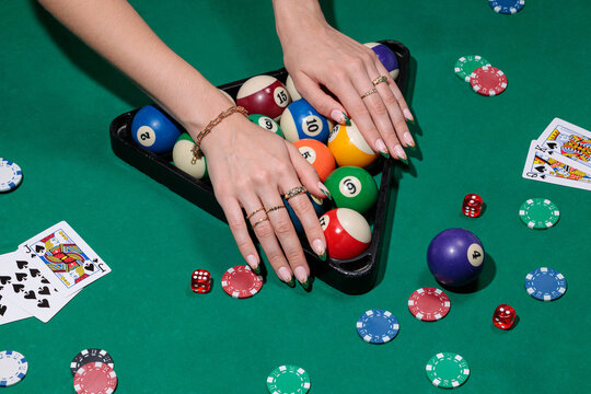 green poker table, hands playing cards, casino, billiard