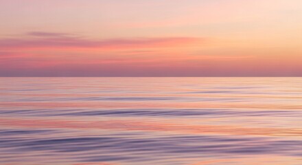 Serene Ocean Horizon at Sunset with Pastel Pink and Orange Sky Reflections