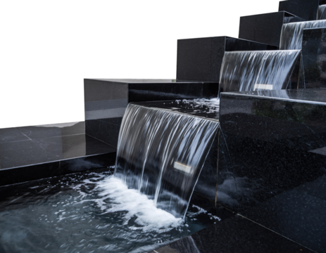 Modern Granite Waterfall Feature with Cascading Water Flowing into a Pool of Water Over Black Stone Steps