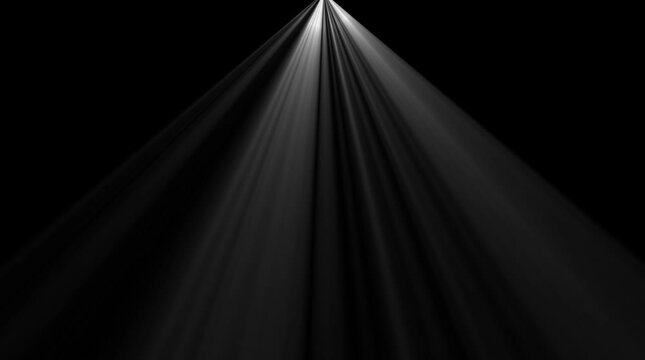 Dramatic spotlight beams piercing through darkness ethereal light rays emanating from above creating a sense of mystery and focus abstract light effect for cinematic backgrounds and visual effects