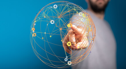 A person pointing at a globe with connections, representing global networks, digital technology, communication, and interconnectednes