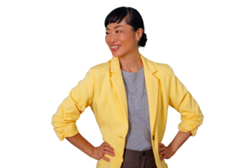 Asian businesswoman smiling confidently, wearing a yellow blazer with hands on hips, cutout on transparent background