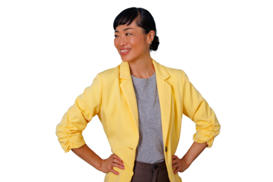 Asian businesswoman smiling confidently, wearing a yellow blazer with hands on hips, cutout on transparent background - Powered by Adobe