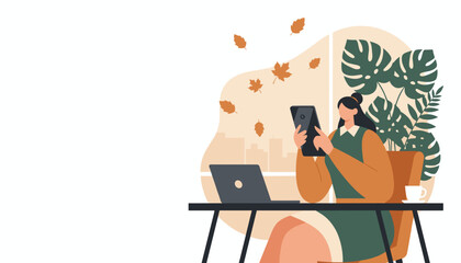 Cozy fall remote work Woman using smartphone at home office desk with laptop plants and falling leaves