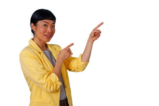 Asian businesswoman pointing fingers, indicating direction for presentation, promoting new product or service, transparent background