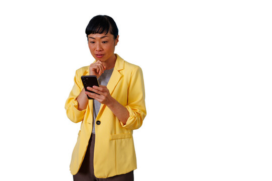 Asian businesswoman analyzing data on smartphone, thinking and planning strategy, wearing yellow blazer, transparent background