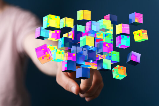 A hand interacting with a collection of colorful 3D cubes, suggesting innovation, technology, or data visualiza