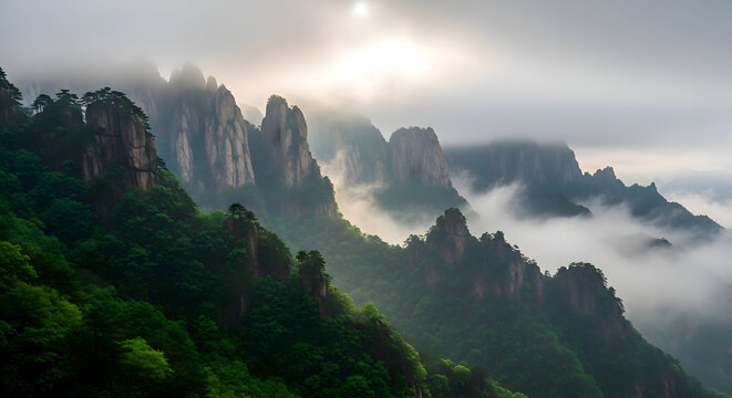 Misty mountain peaks emerge from fog under a bright sky - Powered by Adobe