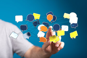 Abstract concept of online communication and networking with connected message bubbles, hand interaction and da