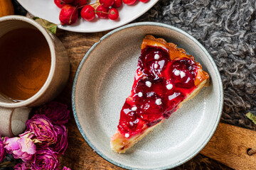 Delightful plum cake pairs perfectly with tea, creating a warm atmosphere on a cool autumn day