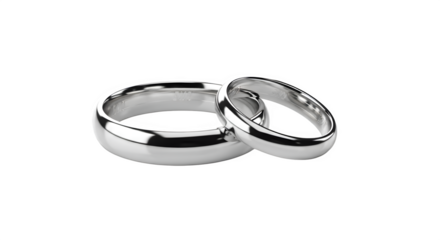 Two elegant silver wedding rings intertwined and reflecting light isolated on transparent background