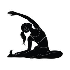 Silhouette of a woman performing a yoga pose with one leg extended