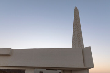 A stunning view of Al Irfan Mosque in Muscat, Oman, showcasing modern Islamic architecture and...