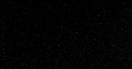 Fototapeta premium Falling snowflakes isolated on black background. Winter snow overlay texture for VFX, compositing, motion graphics and atmospheric effects