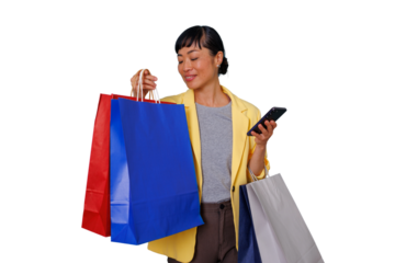 Asian woman holding shopping bags and smartphone, enjoying online retail therapy, comparing prices and deals, black friday sale