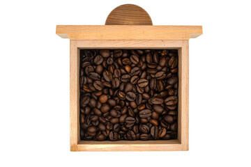 Kaffeebohnen in Schublade aus Holz