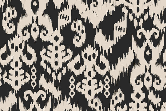 Seamless fabric motif patterns, abstract ikat patterns or abstract ethnic.Bold Black and Cream Tribal Ikat Seamless Pattern. ideal for textiles, fashion prints, wallpaper, home d&eacute;cor, wrapping paper