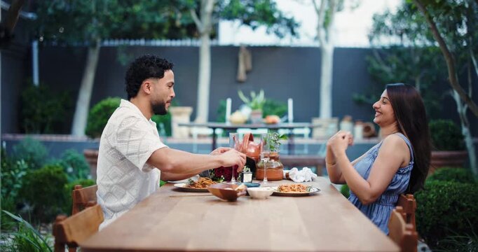 Date, engagement ring and proposal with couple in restaurant together for commitment or love. Marry me, promise and relationship goals with man and woman at table for romance or surprise question - Powered by Adobe