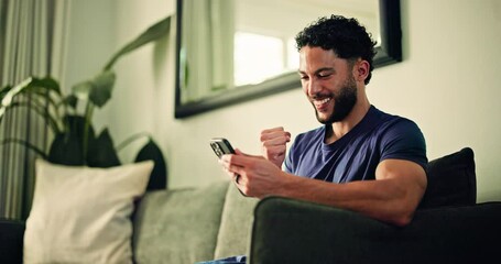 Excited, man and laughing with smartphone, lounge and good news on social media or gambling success. Happy, person and fist pump for betting achievement, notification and browsing on website in house - Powered by Adobe