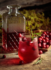 Cranberry cocktail in a frozen glass.