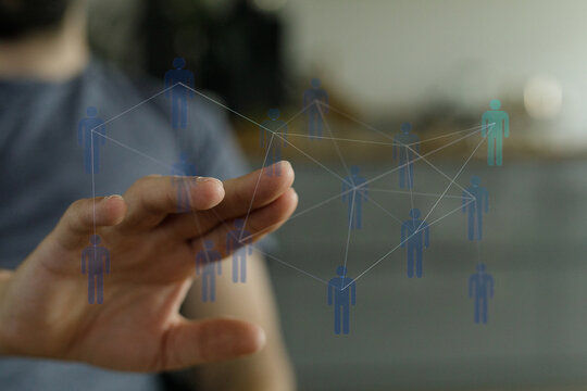 Person touching a digital network interface, illustrating social connections and teamwork. Concept of global co - Powered by Adobe