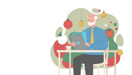 Senior man working on a tablet enjoying coffee in a festive holiday environment