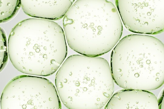 Translucent green gel spheres featuring crisp internal air bubbles, crafted for eco-focused advertising, cosmetic brands, and innovative design visuals