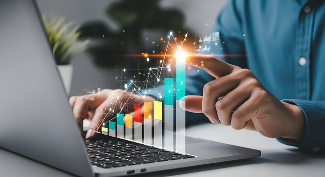Financial growth concept Business person analyzing financial growth chart on laptop with digital data visualization overlay
