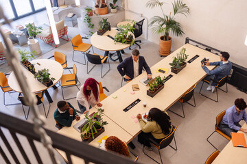 Diverse business team collaborating in a modern open plan office