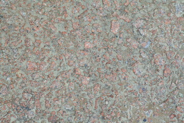 Concrete wall texture with rough surface and natural imperfections. Grey industrial background for design, construction concepts and architectural materials.