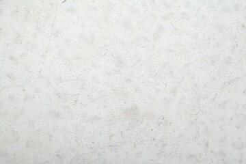 Concrete wall texture with rough surface and natural imperfections. Grey industrial background for design, construction concepts and architectural materials.