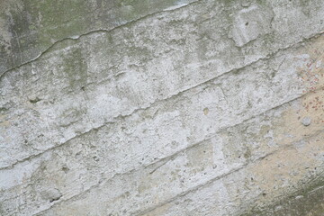 Concrete wall texture with rough surface and natural imperfections. Grey industrial background for design, construction concepts and architectural materials.