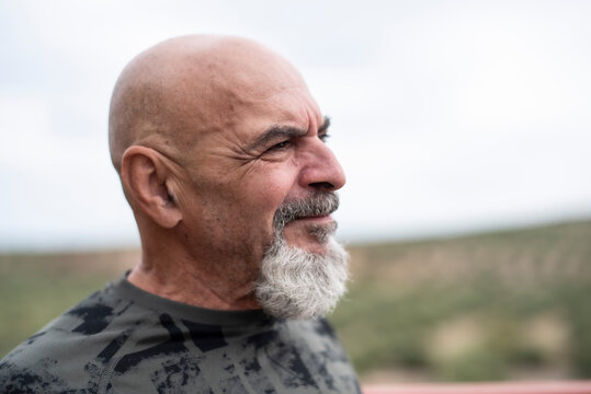 65-year-old man, close-up portrait after playing sports