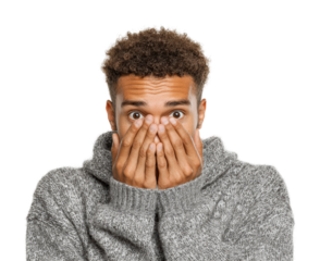 Surprised young man covers face portrait isolated on transparent background