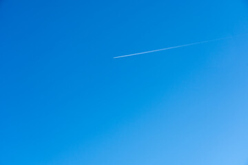 Modern Transportation and Its Effects - Aircraft Contrail in Clear Sky