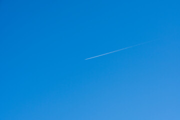 Modern Transportation and Its Effects - Aircraft Contrail in Clear Sky