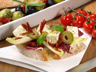 Food - Ciabatta Bread with Feta Cheese, green and black Olives and dried Tomatoes