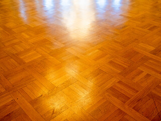 sunlit old wooden parquet flooring