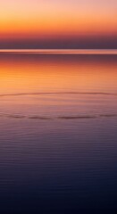 Obraz premium A peaceful, reflective water surface catching the faint light of dawn, offering a sense of deep tranquility and calm stillness, outdoor, lake, dusk