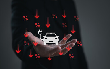 A consumer presents an electric vehicle icon surrounded by falling percentage symbols, representing EV price reduction, discount programs, and financial incentives in the automotive market.
