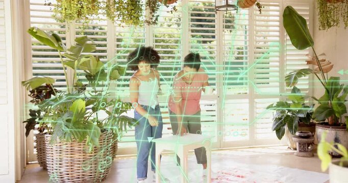 Mother and daughter inspecting stool in home AR overlay popping gestures guiding overlay and choice