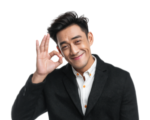 Positive gesture by a smiling man in a business suit portrait isolated on transparent background