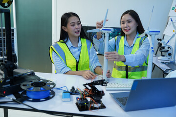 Technicians work with a 3D printer to print a clear white plastic model using cutting-edge technology, focusing on specific points, in a lab.
