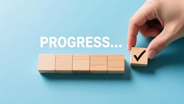 Progress tracking concept with wooden blocks and check mark for project management and task completion