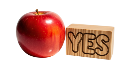 A single ripe red apple placed next to a wooden block with the word yes carved into it isolated on transparent background