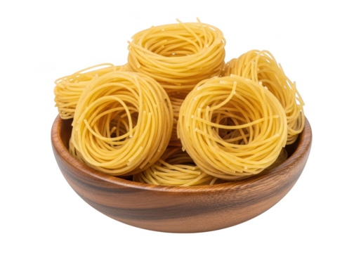 Dry Angel Hair Pasta Nests in a Wooden Bowl