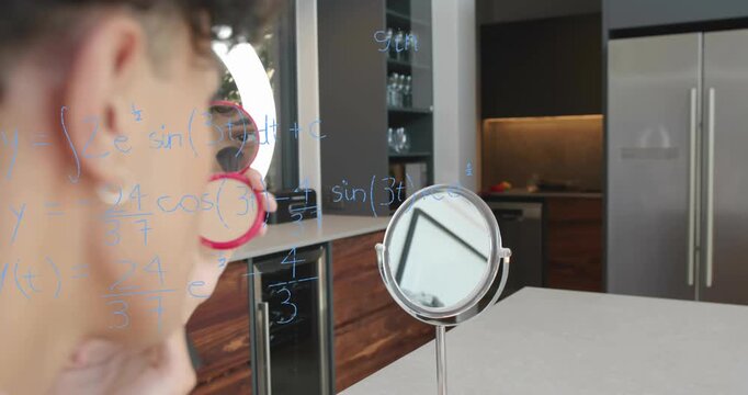 Man holding pink compact, applying makeup for beauty while math overlay forming graph over face