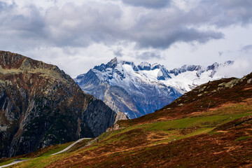 Panoramic view of the Swiss Alps near the municipality of Andermatt in autumn.