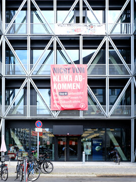 Berlin, Germany, August 19, 2021, building of the "Tageszeitung" - "taz" with poster for environmental protec