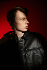 Obraz premium Modern masculinity shines through youthful charm and confidence in captivating portrait